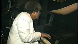 Michael Masser playing piano