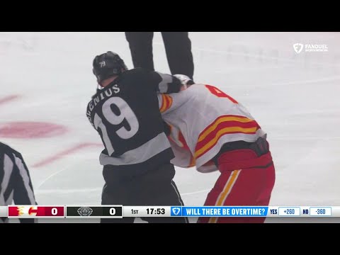 Samuel Helenius drops the gloves with Adam Klapka.