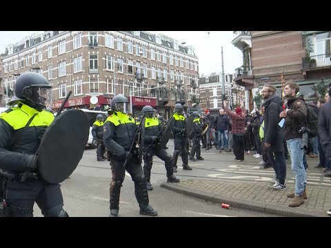 Police clash with anti-lockdown protesters in Amsterdam
