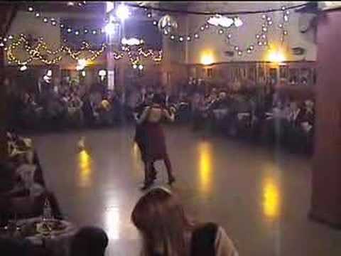  Osvaldo Zotto  and  Lorena Ermocida  are  dancing  to  the  tango  "  Nochero Soy  "  or  "  Chique  "