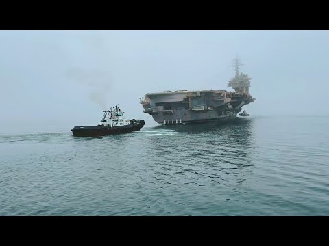 Ex-USS Kitty Hawk towed in its final transit from Naval Base Kitsap – Bremerton, Washington.