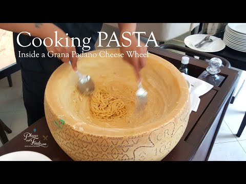 Cooking Pasta Inside a Grana Padano Cheese Wheel