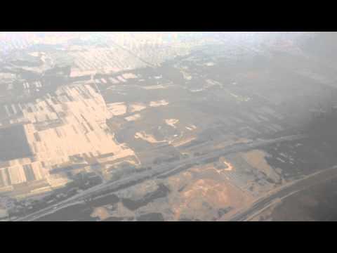 Shandong Airlines Boeing 737-800 pousando no Aeroporto Internacional de Jinan