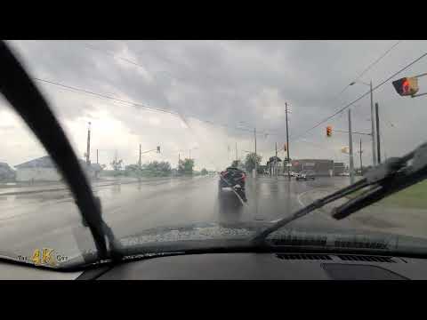 Raw dashcam 30+ minute footage driving through rainstorm towards...