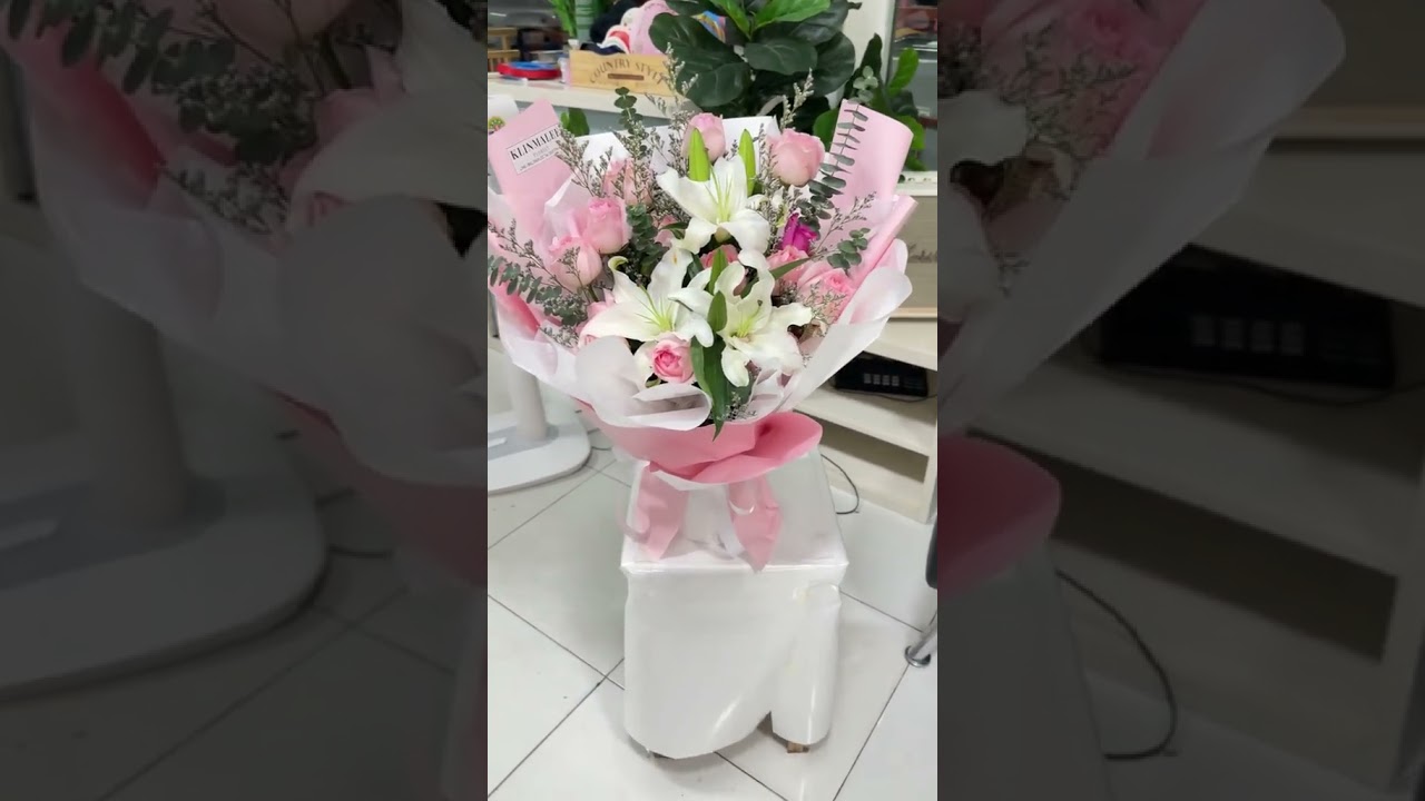 Bouquet of pink roses and lilies