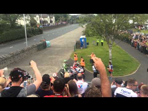 John mcguinness winning the isle of man tt senior superbike race 2015 doing burnout James hillier