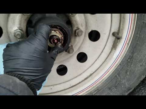 How to check and adjust bearings on a gooseneck. 7k axles. 14Gn trailer. Dexter axle.