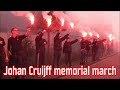 Ajax fans marching through Amsterdam in memory of Johan Cruijff