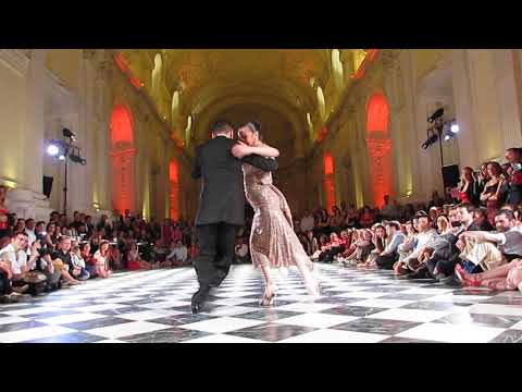  Neri Piliu  and  Yanina Quiñones  are  dancing  to  the  tango  "  Rie Payaso  "  at  Torino Tango Festival  in  2019