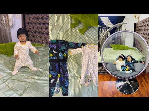 Arabi and Ariba are wearing winter clothes.  And they dance to their mother's rhymes.