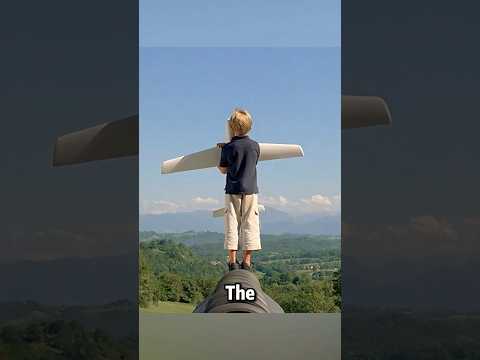 Boy tries to fly in toy airplane. #shorts