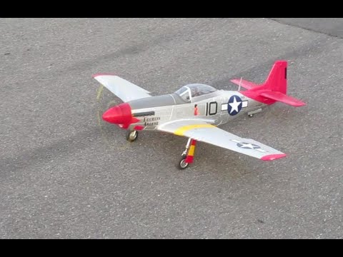 FMS 1450mm P-51Mustang Red Tail against a majestic billowy sky