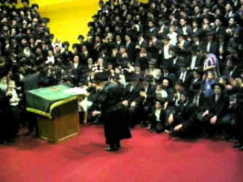 Skverrer Rebbe dancing with a Torah Scroll