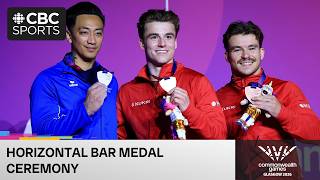 Felicx Dolci and William Émard receive horizontal bar medals, Canadian anthem plays in Glasgow