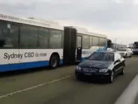 my sydney: long line of buses crossing harbour bridge peak hour