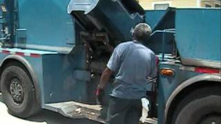 preview picture of video 'LODAL MANUAL SIDE LOADER ON RESIDENTIAL TRASH RUN IN TAMPA, FL on 8-17-10'