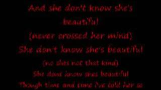sammy kershaw - she don't know she's beautiful (lyrics)