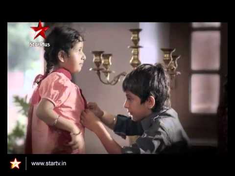 Kanwalpreet Veera's mother learns stitching a button