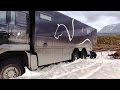 Expedition vehicle stuck in the snow • World tour