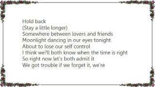 Kenny Rogers - Somewhere Between Lovers and Friends Lyrics