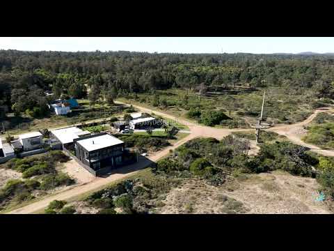 Video aéreo sobre la costa del balneario Sauce de Portezuelo M3 17807