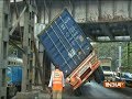 Truck gets stuck under railway bridge in Mumbai