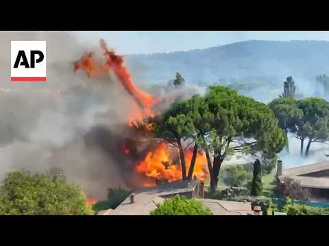 Video Thumbnail: Aerials of wildfire approaching homes in Madrid region released by Spanish Civil Guard