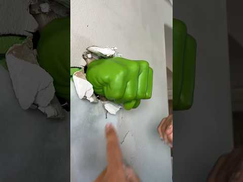 He fixes the hole in the wall! 👊