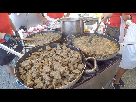 Italy Street Food. Beef Stew, Sausages, Blue Cheese, Corn 'Polenta'. Sagra delle Sagre. Asti