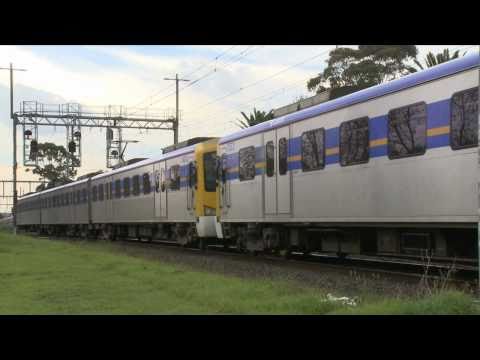 Connex Suburban Electric Passenger Trains Crossing in Melbourne, Australia