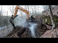 Digging in a driveway with a new excavator