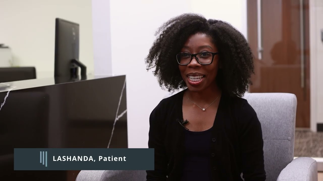 Woman giving an interview in a periodontal office in Dallas