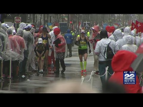Runners brave freezing rain and strong winds at Boston Marathon
