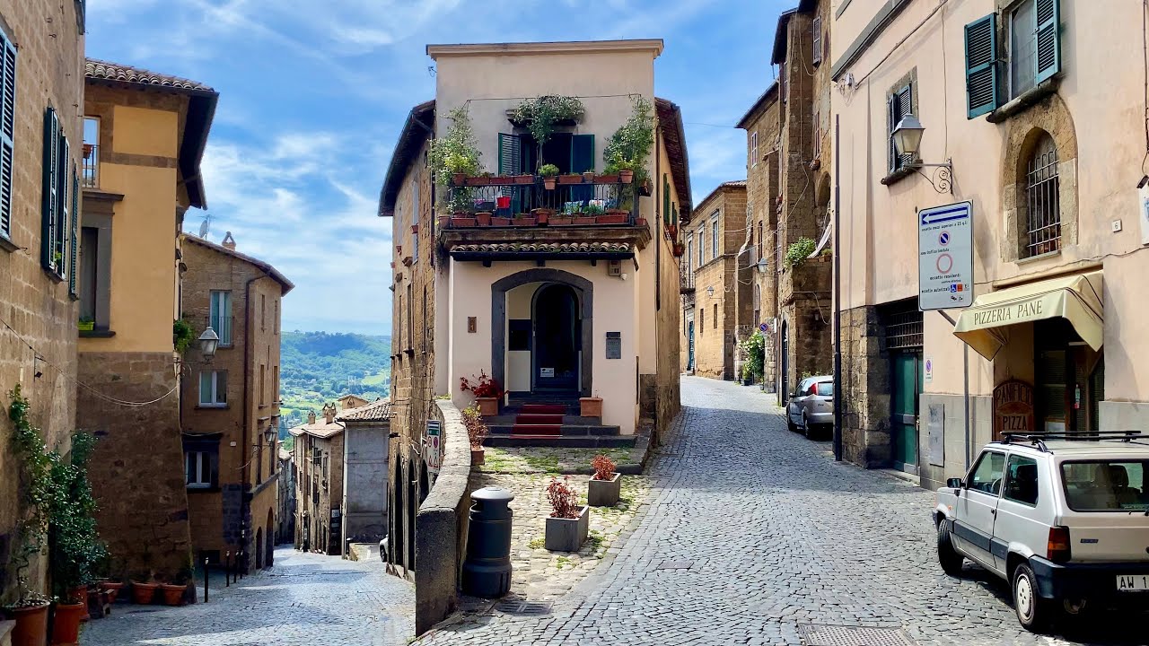 Immersive street-level walking tour through Orvieto Duomo, Italy, showcasing authentic urban landscapes, local architecture, and the vibrant atmosphere of the city's neighborhoods