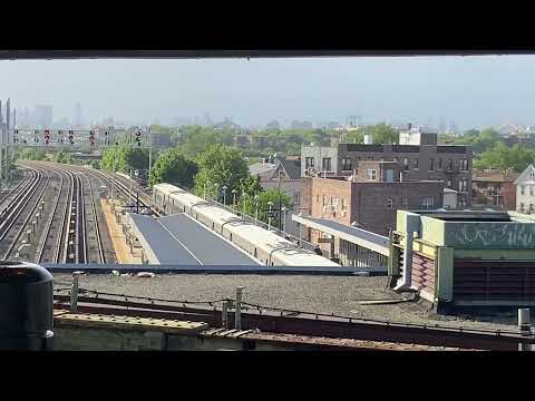 Three LIRR and two IRT Flushing 7 trains in 2.5 minutes, Woodside, Queens, 1740 Thursday 26 May 2022
