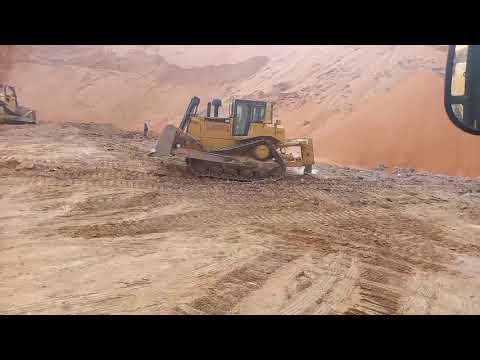 CAT D8T DOZER RIPPING THROUGH HARD ROCKS