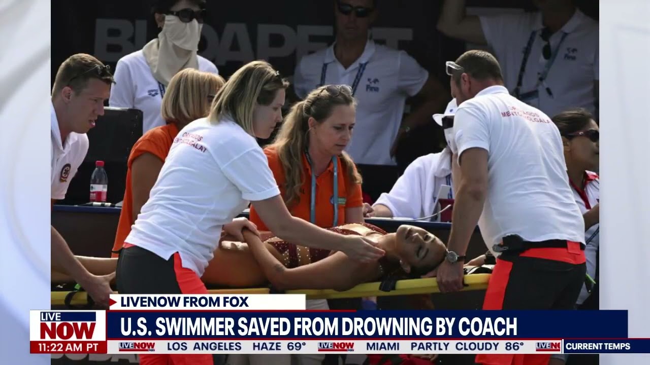 Kristi Larson - Swimmer saved after fainting at World Championships