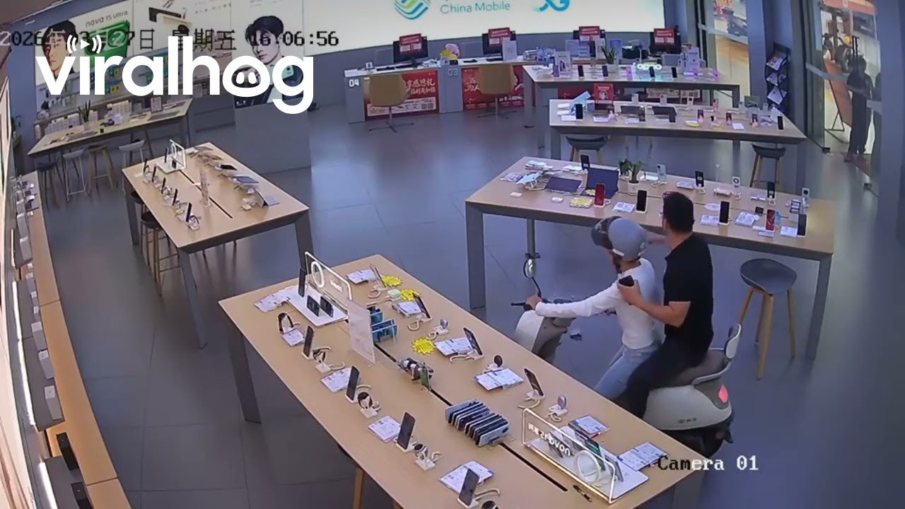 Woman Purchases Cell Phone While Riding Electric Scooter || ViralHog