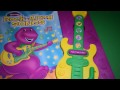 BARNEY ROCK ALONG SONGS PLAY A SONG GUITAR SOUND BOOK BARNEY THE DINOSAUR PLAY A SOUND ELECTRONIC