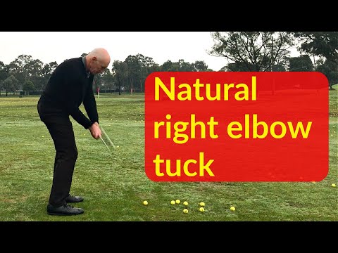 Part of a video titled Right elbow tucked in golf swing - YouTube