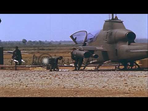 US Army helicopters AH-1G and OH-6A during operation in Vietnam. HD Stock Footage