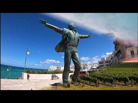 DOMENICO MODUGNO        UN CALCIO ALLA CITTA'