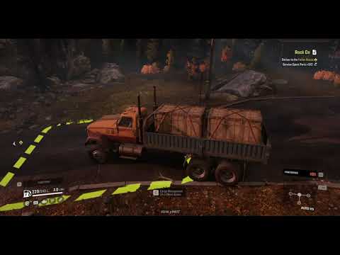 snow runner GMC MH9500 deliver service spare part to the fallen rocks