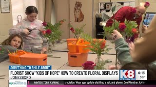 Jonesboro florist teaches Kids of Hope students to create bouquets for hospice patients