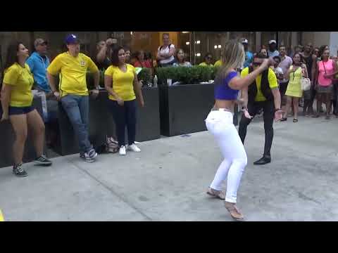 BRAZILIAN GIRL DANCES A BRAZILIAN SAMBA STREET DANCE AT BRAZILIAN CARNIVAL CULTURE PARTY NEW YORK