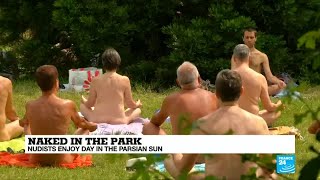 Paris: Naked in a park Parisian nudists enjoy a ho