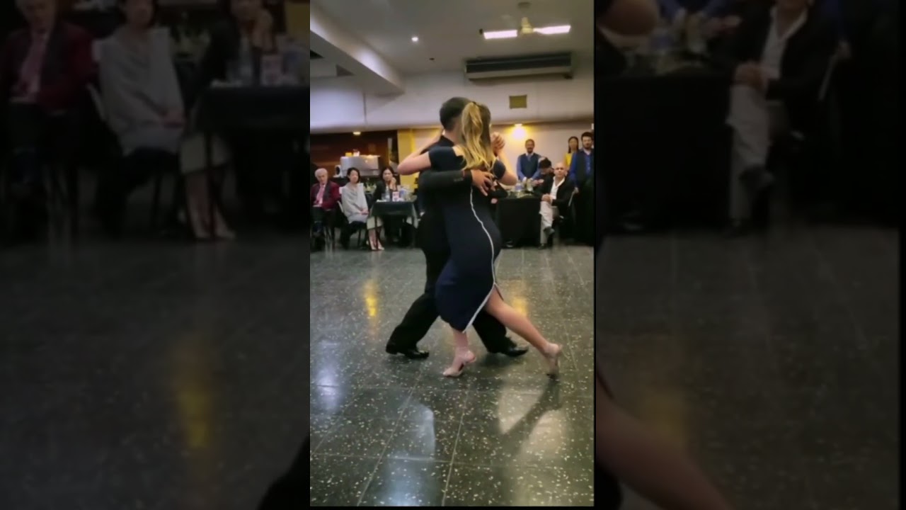 Featured artists Morena Márquez and Lucio Galván dancing milonga
