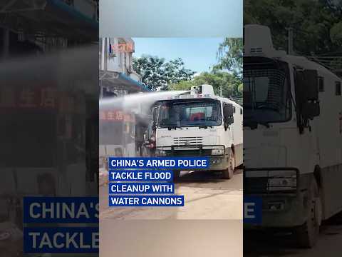 Post-flood cleanup: Chinese armed police deploy water cannon truck