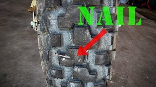 how to fix a flat rear tire on a TW200