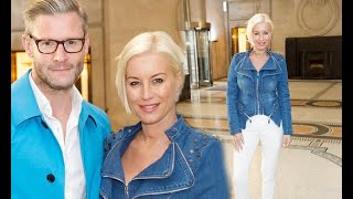 Denise Van Outen cuddles up to beau Eddie Boxshall at the theatre